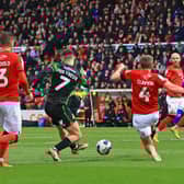 Doncaster Rovers' Luke Molyneux fires home his first of two quickfire goals against Swindon Town.