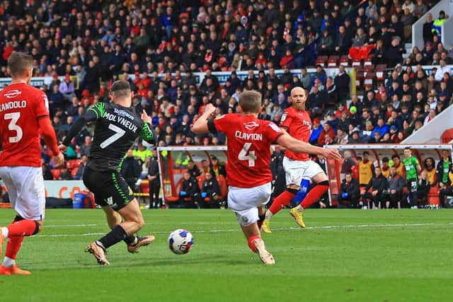 Doncaster Rovers' Luke Molyneux fires home his first of two quickfire goals against Swindon Town.