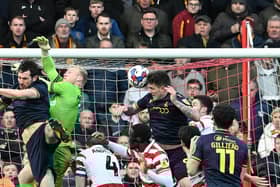 Andy Cook heads home for Bradford.