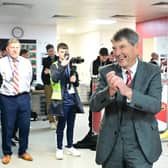 Terry Bramall celebrates with the Rovers players post-match.