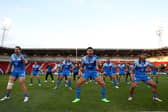 Members of Samoa perform the Siva Tau ahead of kick off during the Rugby League World Cup 2021 Pool A match between Samoa and Greece at the Eco-Power Stadium. Photo: Charlotte Tattersall/Getty Images for RLWC