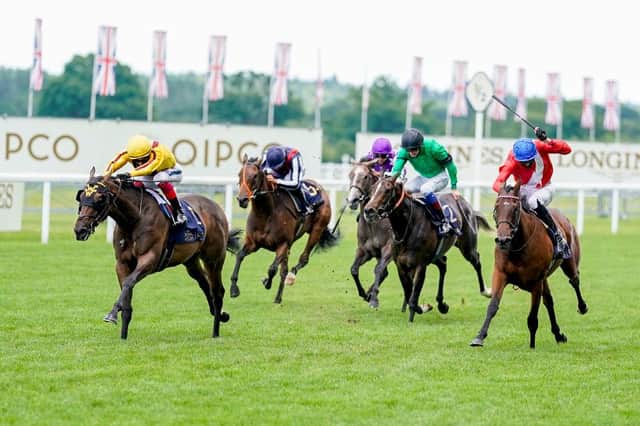 Campanelle, left, on the way to victory in last year's Queen Mary Stakes at Royal Ascot. Photo by ALAN CROWHURST/POOL/AFP via Getty Images