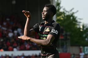 Mo Faal celebrates his goal.