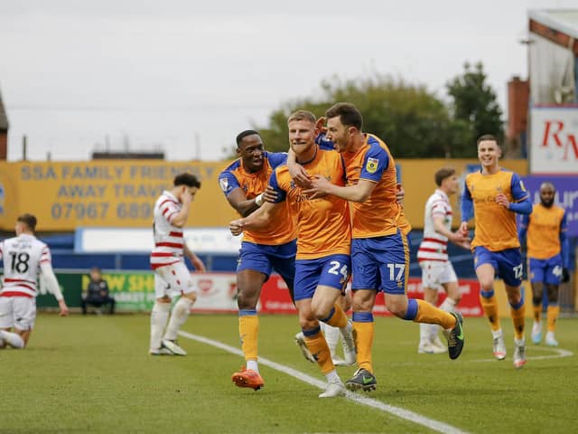 Alfie Kilgour celebrates his screamer against Doncaster. Photo credit Chris Holloway / The Bigger Picture.media