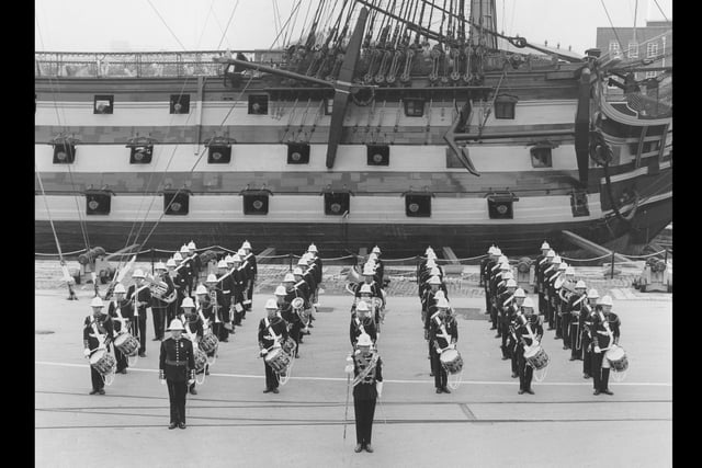 Royal Marine Band of the Commander in Chief Naval Home Command alongside HMS Victory in Her Majesty's Naval Base, Portsmouth, 1982. The News PP5161
