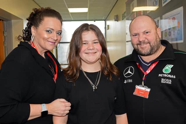 Kobi Laybourne, 11, pictured with his parents Kelly and Paul before the event. Picture: NDFP-14-02-20 AshHill CharityHaircut 1-NMSY