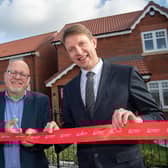 Deputy Mayor Glyn Jones and Harron Homes Sales Manager Paul Walters.