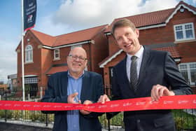 Deputy Mayor Glyn Jones and Harron Homes Sales Manager Paul Walters.