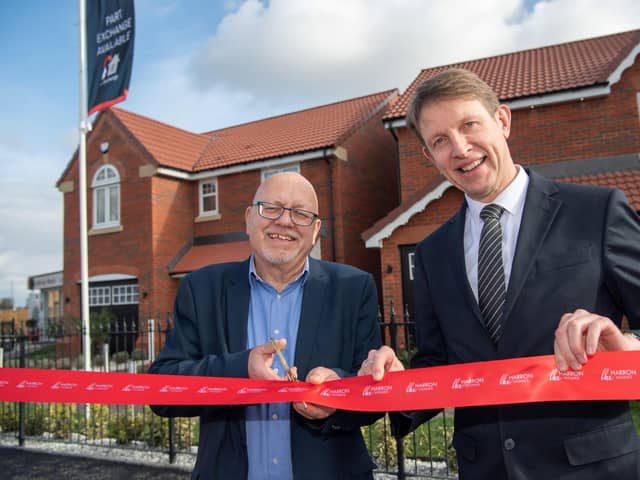 Deputy Mayor Glyn Jones and Harron Homes Sales Manager Paul Walters.