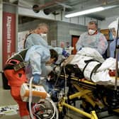 Emergency services work to save the life of a pensioner who suffered a massive heart attack during a gym session at the Eco-Popwer Stadium, Doncaster