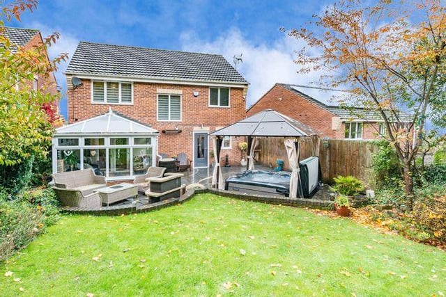 This five-bedroom detached house in Mosborough has an asking price of £399,950. In the back garden there is a hot tub and barbecue area. (https://www.zoopla.co.uk/for-sale/details/56766089)