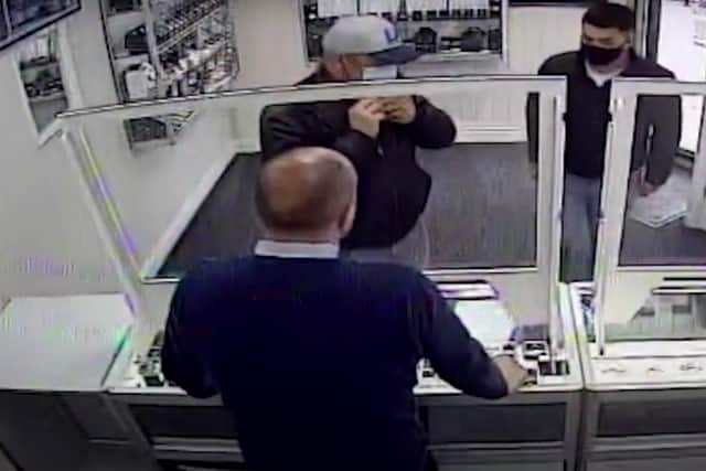Police want to trace the two men who entered the store.