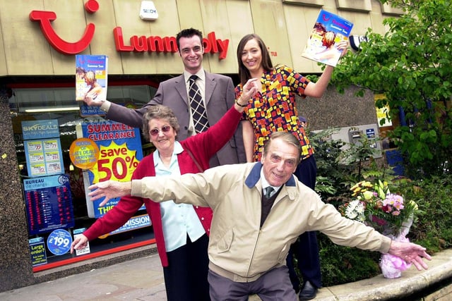 May 4 2005 -  George Barnard and Audrey Boardman, of Adwick, celebrate booking the first holiday from Robin Hood Airport. Looking on were the airport's business development manager, Gareth Kennedy, and Lunn Poly sales consultant, Natalie Skelton.