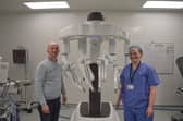 Michael Smethurst and Colorectal Consultant Miss Victoria Proctor pictured with surgical robot.