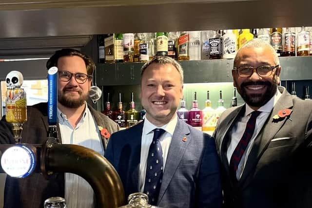 Foreign Secretary James Cleverly (right) dropped into the King William in Scaftworth for a bite to eat.