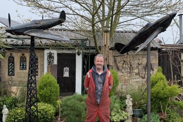 Ian Curran with his Spitfire and Hurricane.