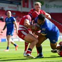 Dons' Albert Vete drives to the try line against Oldham. Picture: Howard Roe/AHPIX.com