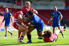 Dons' Albert Vete drives to the try line against Oldham. Picture: Howard Roe/AHPIX.com