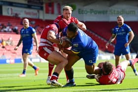 Dons' Albert Vete drives to the try line against Oldham. Picture: Howard Roe/AHPIX.com