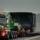 Warning as police escort an abnormal load on the M18.