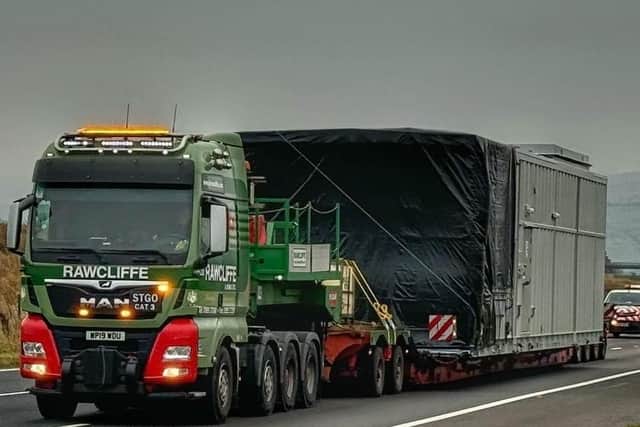 Warning as police escort an abnormal load on the M18.