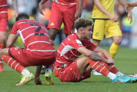 Josh Martin shows his disappointment at the final whistle. Picture: Howard Roe/AHPIX LTD