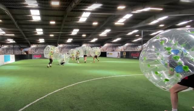 The Rovers squad take part in zorb football at Paul Green's A1 Football Factory