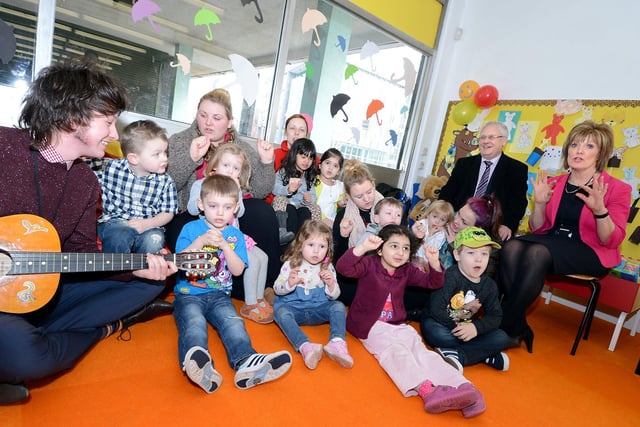 Mayor and Deputy Mayor of Doncaster, Peter Davies and Councillor Cynthia Ransome at the official re-opening in 2011, with children from a local nursery. Guitar player is Thomas Wilcox, a member of the library staff