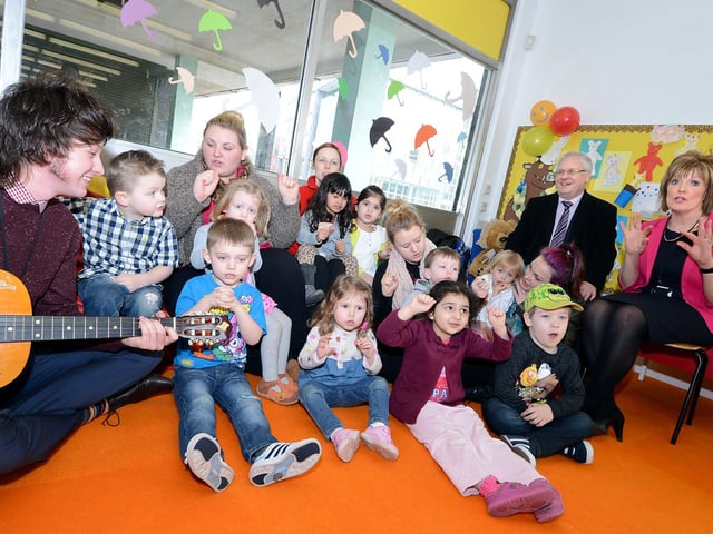 Mayor and Deputy Mayor of Doncaster, Peter Davies and Councillor Cynthia Ransome at the official re-opening in 2011, with children from a local nursery. Guitar player is Thomas Wilcox, a member of the library staff
