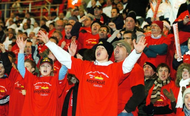 Can you spot yourself in these crowds of football fans?
