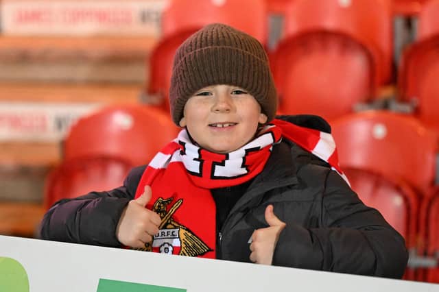 Doncaster Rovers fans watching the derby win over Huddersfield.