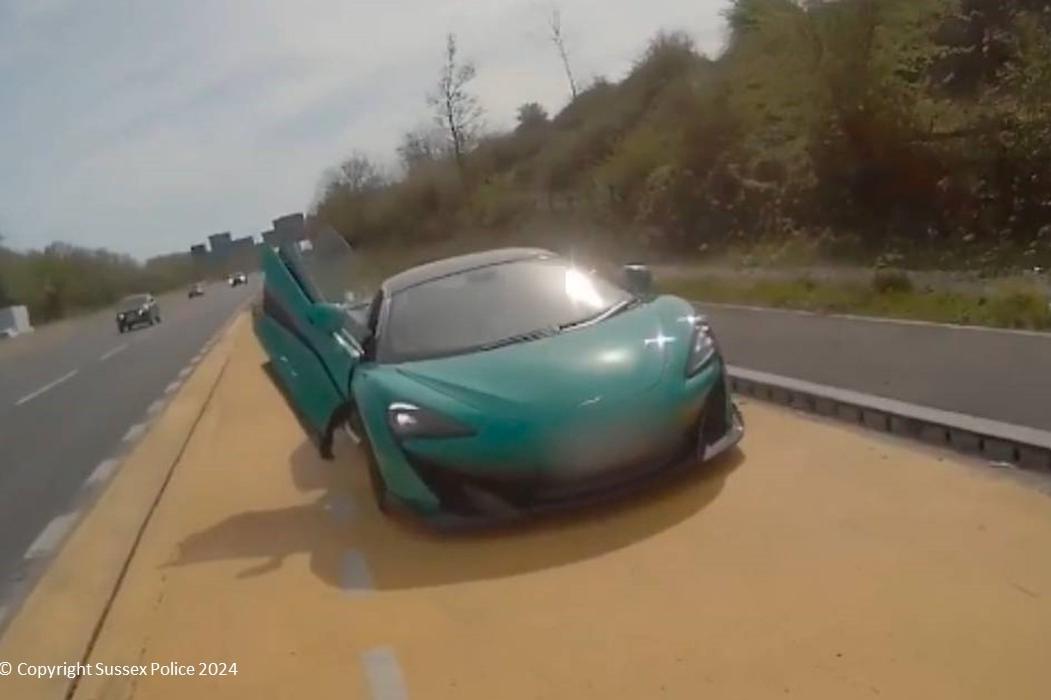 "Reckless" £185k McLaren driver speeds at 130mph past police vehicle in shocking dashcam footage