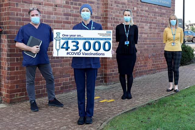 Pictured outside the vaccination centre are team members Steve Davies, Barbara Symonds, Charlotte Almond and Claire Lee