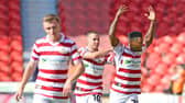 Kieran Agard celebrates his winner in injury time.