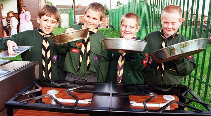 32nd (Armthorpe) Doncaster Scout Group scouts, from left, Graham Pratt, aged nine, Christopher Stretton, aged 11, Lee Colclough, aged nine, and Michael Colclough, aged 11, try out the new cooking stove and bain-marie, June 1998