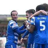Luke Molyneux celebrates his second goal with his teammates. Picture: Howard Roe/AHPIX LTD