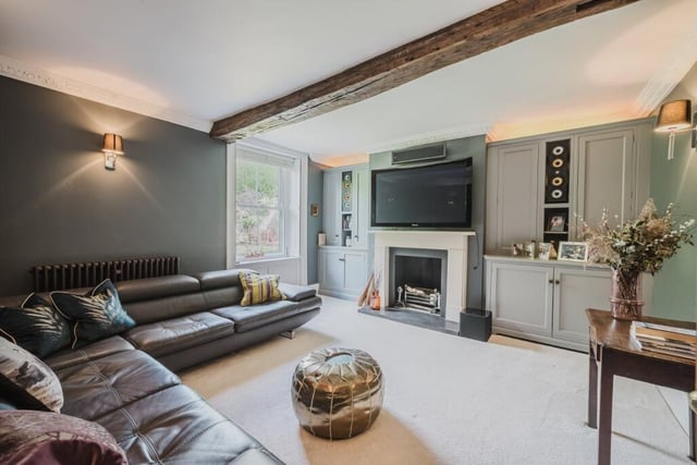 Another comfortable room with built-in cabinetry.