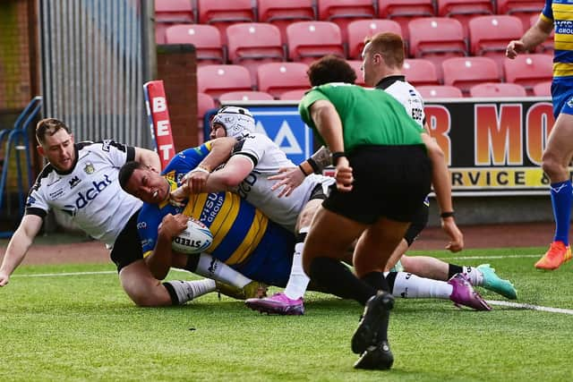 Reece Lyne scores the Dons' second try. Picture: Howard Roe/AHPIX.com