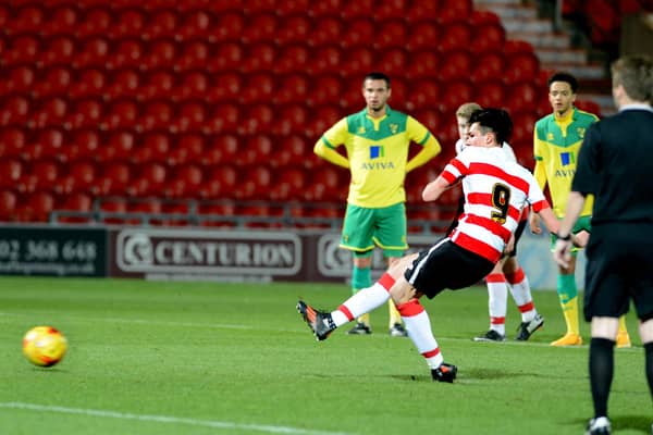 Jack McKay scoring from the penalty spot for Doncaster Rovers during a youth team game against Norwich City.