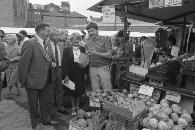 Sunderland's new open-air market was officially opened in 1984 by the Mayor, Councillor George Elliott. The Mayor and Mayoress are pictured with Neil Wright, a director of the the developers, Cameron Hall and Ben Cooney, one of the stall holders.