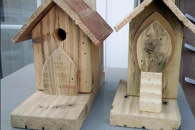 Bird houses created by Paul Cook using offcuts of wood.