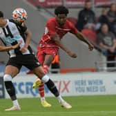 Trialist Shayon Harrison curls a shot onto the crossbar against Newcastle United. Picture: Howard Roe/AHPIX