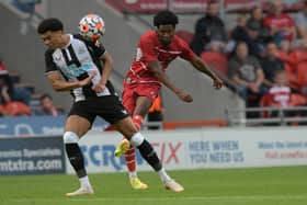 Trialist Shayon Harrison curls a shot onto the crossbar against Newcastle United. Picture: Howard Roe/AHPIX