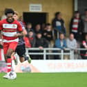 Deji Sotona in action for Doncaster Rovers.