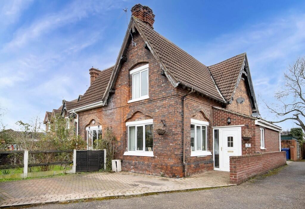 The appealing frontage of the 19th century cottage that is for sale at £140,000.
