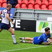 Olly Butterworth scores Dons' second try against Midlands Hurricanes.