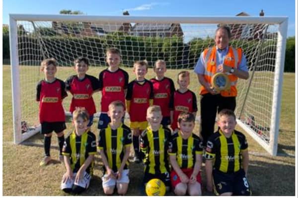 Dean Finch has donated a defibrillator to his grandson's football team.