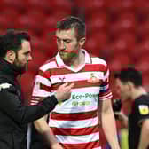 Doncaster Rovers head coach Danny Schofield wants captain Tom Anderson to stay at the club.