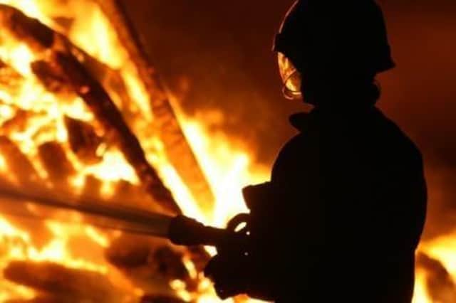 South Yorkshire firefighter tackles a blaze.