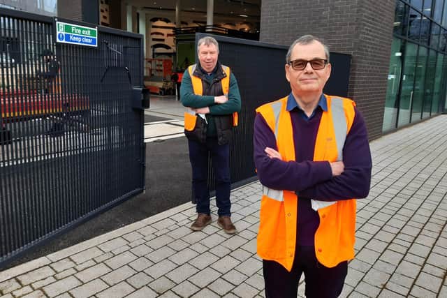Chris Barron and Simon Ward welcome Green Arrow to Doncaster museum
